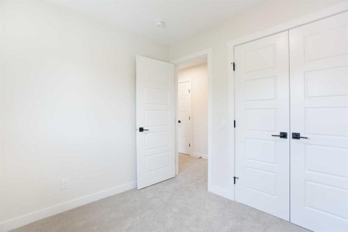 24 Hawkwood Crescent Nw, Calgary, AB - Indoor Photo Showing Other Room