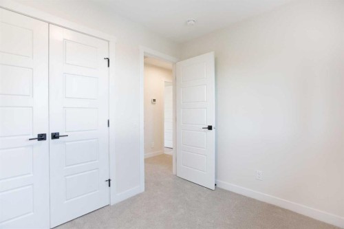 24 Hawkwood Crescent Nw, Calgary, AB - Indoor Photo Showing Other Room