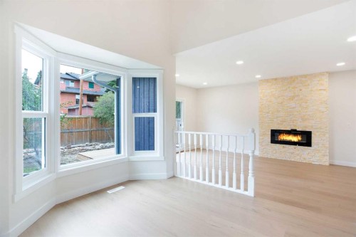 24 Hawkwood Crescent Nw, Calgary, AB - Indoor With Fireplace