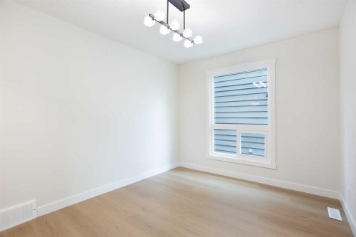 24 Hawkwood Crescent Nw, Calgary, AB - Indoor Photo Showing Other Room
