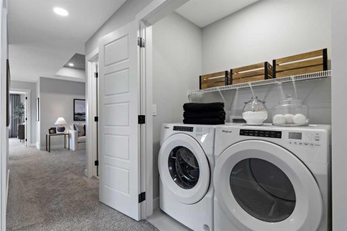 36 Creekstone Grove Sw, Calgary, AB - Indoor Photo Showing Laundry Room
