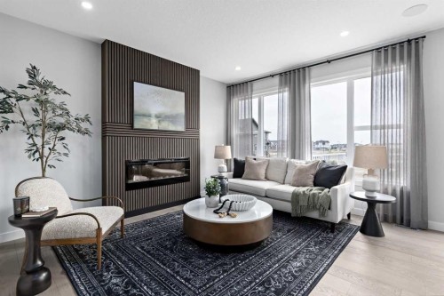 36 Creekstone Grove Sw, Calgary, AB - Indoor Photo Showing Living Room With Fireplace