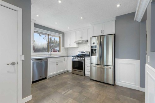 159 Brookgreen Drive Sw, Calgary, AB - Indoor Photo Showing Kitchen With Upgraded Kitchen