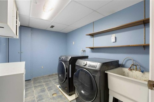 159 Brookgreen Drive Sw, Calgary, AB - Indoor Photo Showing Laundry Room
