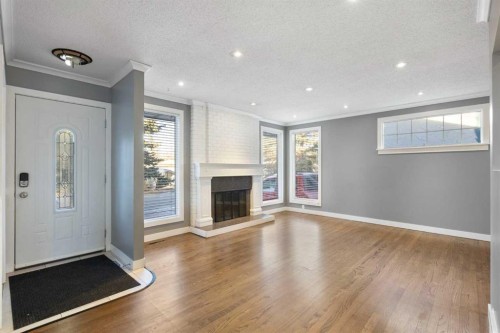 159 Brookgreen Drive Sw, Calgary, AB - Indoor With Fireplace