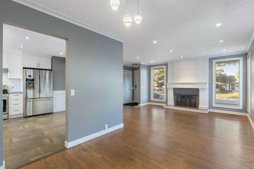 159 Brookgreen Drive Sw, Calgary, AB - Indoor With Fireplace