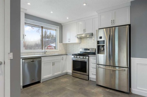 159 Brookgreen Drive Sw, Calgary, AB - Indoor Photo Showing Kitchen With Upgraded Kitchen