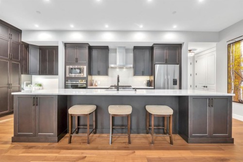 302-105 Lebel Crescent Nw, Calgary, AB - Indoor Photo Showing Kitchen With Upgraded Kitchen