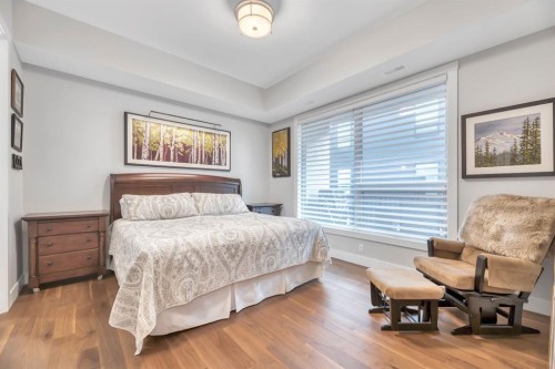 302-105 Lebel Crescent Nw, Calgary, AB - Indoor Photo Showing Bedroom