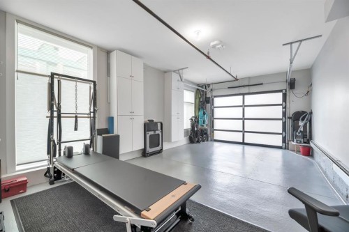 302-105 Lebel Crescent Nw, Calgary, AB - Indoor Photo Showing Garage