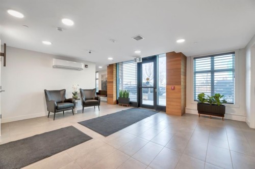 302-105 Lebel Crescent Nw, Calgary, AB - Indoor Photo Showing Other Room