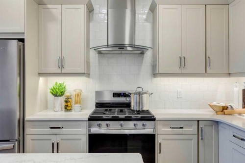 92 Creekside Street Sw, Calgary, AB - Indoor Photo Showing Kitchen With Upgraded Kitchen