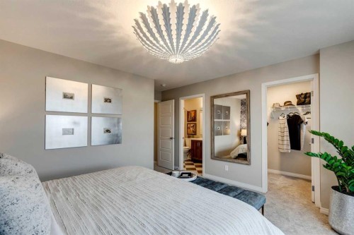 92 Creekside Street Sw, Calgary, AB - Indoor Photo Showing Bedroom