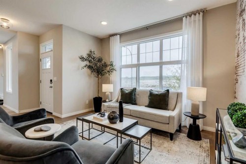 92 Creekside Street Sw, Calgary, AB - Indoor Photo Showing Living Room