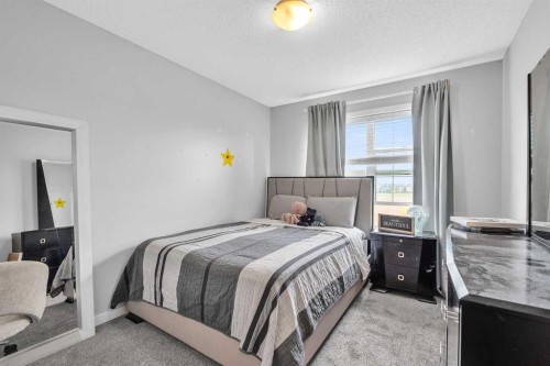 381 Legacy Boulevard Se, Calgary, AB - Indoor Photo Showing Bedroom