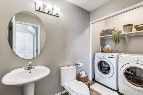 157 Arbour Crest Road Nw, Calgary, AB - Indoor Photo Showing Laundry Room