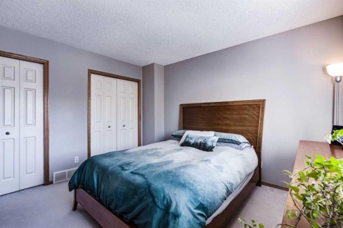 157 Arbour Crest Road Nw, Calgary, AB - Indoor Photo Showing Bedroom