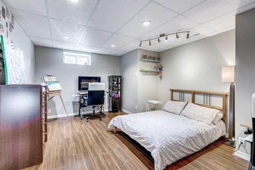 157 Arbour Crest Road Nw, Calgary, AB - Indoor Photo Showing Bedroom