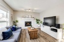 157 Arbour Crest Road Nw, Calgary, AB  - Indoor Photo Showing Living Room With Fireplace 