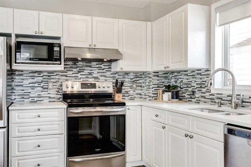 157 Arbour Crest Road Nw, Calgary, AB - Indoor Photo Showing Kitchen With Double Sink With Upgraded Kitchen