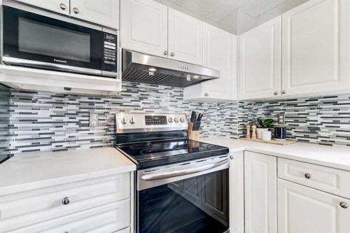 157 Arbour Crest Road Nw, Calgary, AB - Indoor Photo Showing Kitchen With Upgraded Kitchen