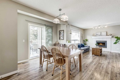 157 Arbour Crest Road Nw, Calgary, AB - Indoor Photo Showing Other Room With Fireplace