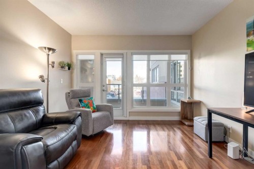 219-1110 3 Avenue, Calgary, AB - Indoor Photo Showing Living Room