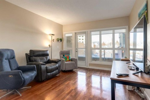 219-1110 3 Avenue, Calgary, AB - Indoor Photo Showing Living Room