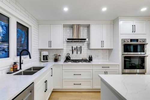 4528 Vegas Road Nw, Calgary, AB - Indoor Photo Showing Kitchen With Stainless Steel Kitchen With Double Sink With Upgraded Kitchen