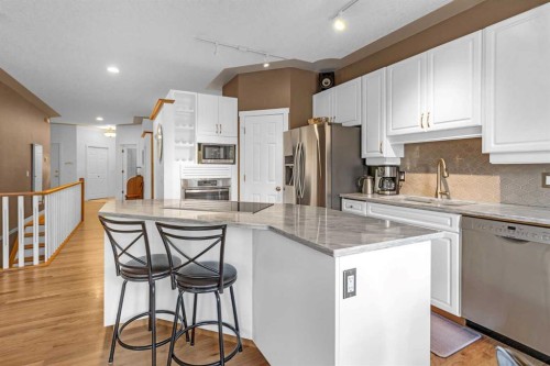 28 Prominence View Sw, Calgary, AB - Indoor Photo Showing Kitchen With Stainless Steel Kitchen With Upgraded Kitchen