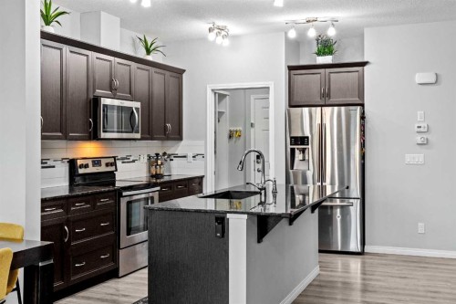74 Legacy Glen Common Se, Calgary, AB - Indoor Photo Showing Kitchen With Upgraded Kitchen
