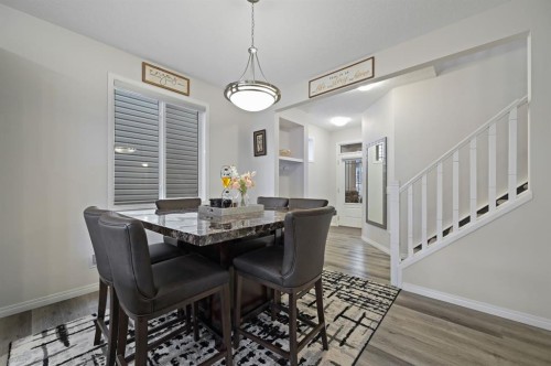 418 Windrow Common Sw, Airdrie, AB - Indoor Photo Showing Dining Room