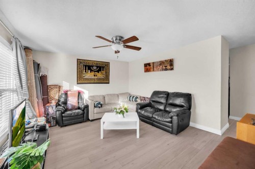 48 Faldale Close Ne, Calgary, AB - Indoor Photo Showing Living Room