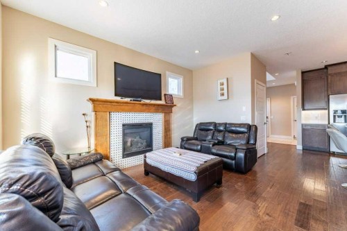 1241 Westmount Drive, Strathmore, AB - Indoor Photo Showing Living Room With Fireplace