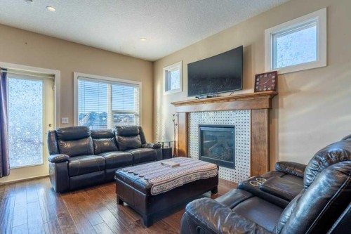 1241 Westmount Drive, Strathmore, AB - Indoor Photo Showing Living Room With Fireplace