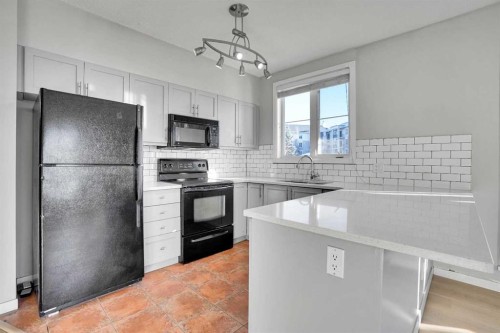 1119-333 Taravista Drive Ne, Calgary, AB - Indoor Photo Showing Kitchen