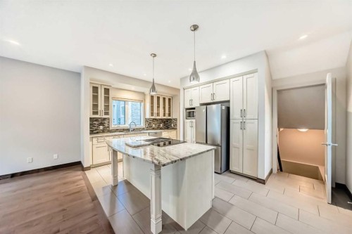 3825 1 Street Ne, Calgary, AB - Indoor Photo Showing Kitchen With Stainless Steel Kitchen With Upgraded Kitchen