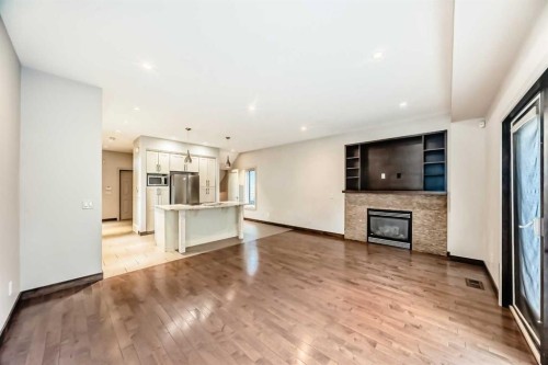 3825 1 Street Ne, Calgary, AB - Indoor With Fireplace