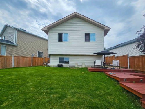 94 Hidden Spring Green Nw, Calgary, AB - Outdoor With Deck Patio Veranda With Exterior