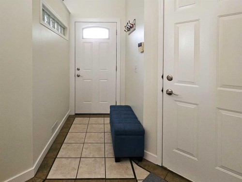 94 Hidden Spring Green Nw, Calgary, AB - Indoor Photo Showing Other Room