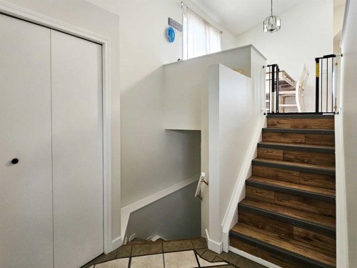 94 Hidden Spring Green Nw, Calgary, AB - Indoor Photo Showing Other Room