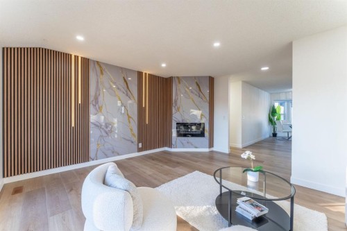 344 Templeview Drive Ne, Calgary, AB - Indoor Photo Showing Living Room With Fireplace