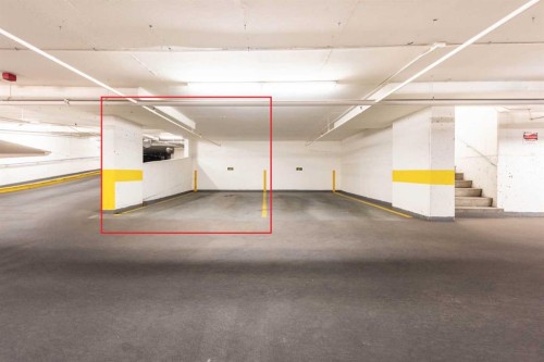 311-9800 Horton Road Sw, Calgary, AB - Indoor Photo Showing Garage