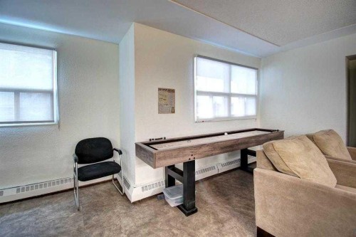 311-9800 Horton Road Sw, Calgary, AB - Indoor Photo Showing Other Room