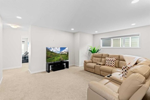 492 Chinook Gate Square Sw, Airdrie, AB - Indoor Photo Showing Living Room