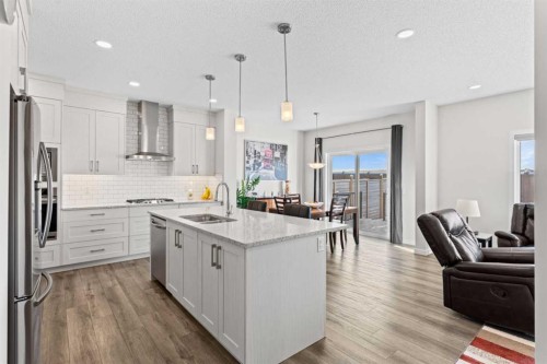 492 Chinook Gate Square Sw, Airdrie, AB - Indoor Photo Showing Kitchen With Double Sink With Upgraded Kitchen