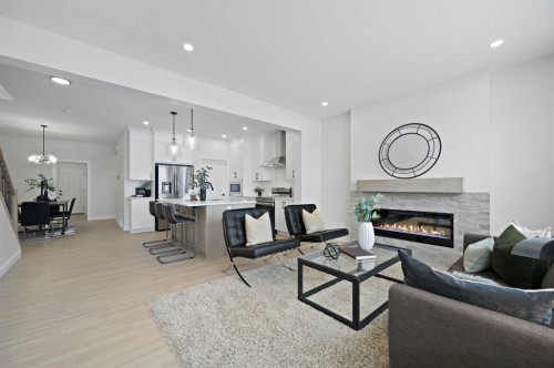 111 Fireside Street, Cochrane, AB - Indoor Photo Showing Living Room With Fireplace