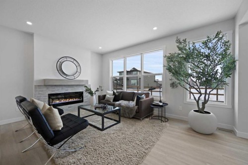 111 Fireside Street, Cochrane, AB - Indoor Photo Showing Living Room With Fireplace