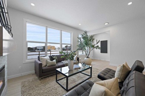 111 Fireside Street, Cochrane, AB - Indoor Photo Showing Living Room With Fireplace