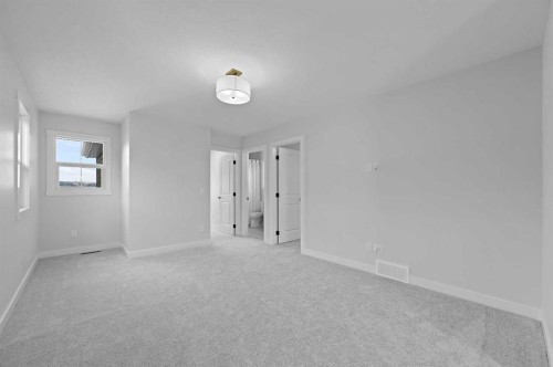 111 Fireside Street, Cochrane, AB - Indoor Photo Showing Other Room